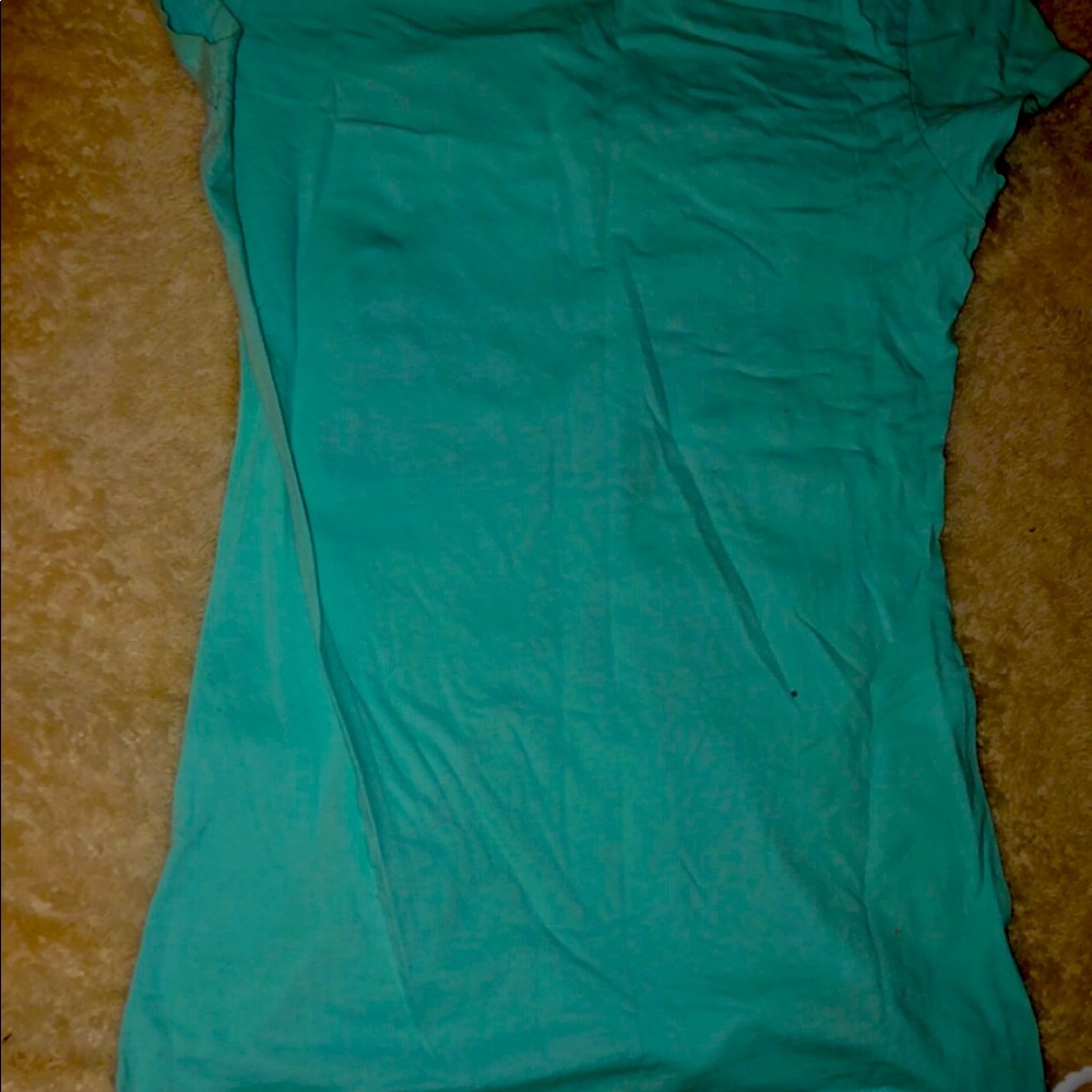 hello shoppers! This a blue cotton short sleeve tee, size small.